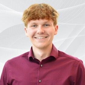 Staff member Alex McElroy from d1c053e11056