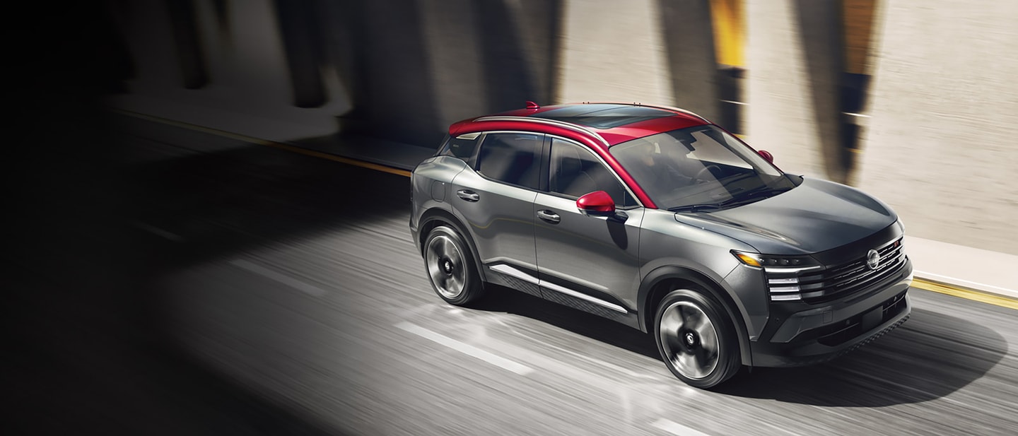  New Nissan Sentra side view with family getting inside