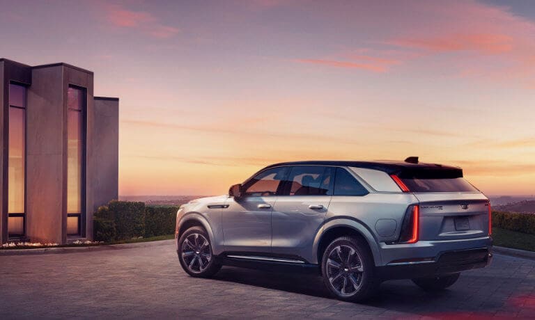 2025 Cadillac Escalade IQ outside modern building