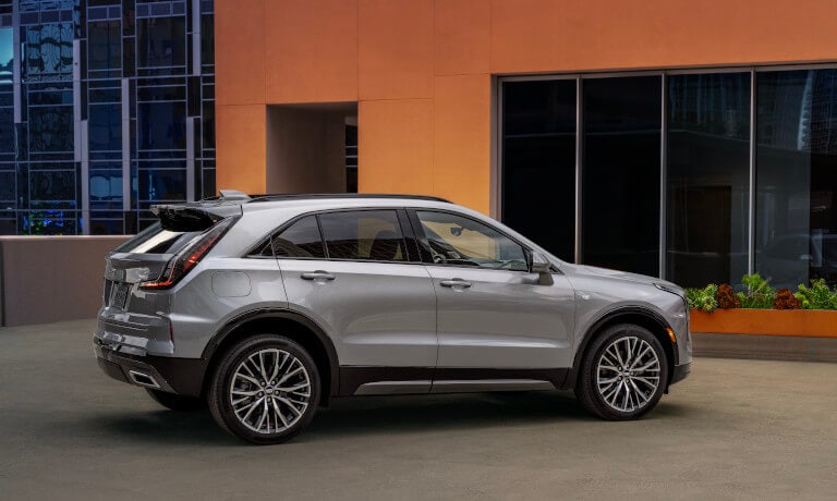 2025 Cadillac XT4 side view by orange wall