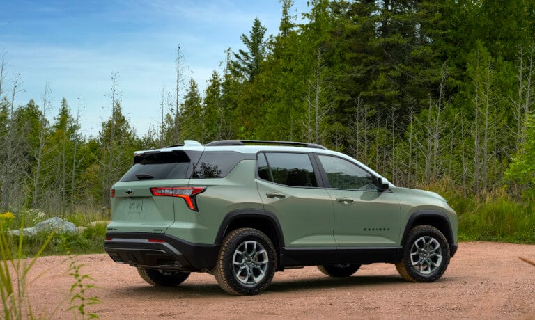 2026 Chevy Equinox parked in forest clearing