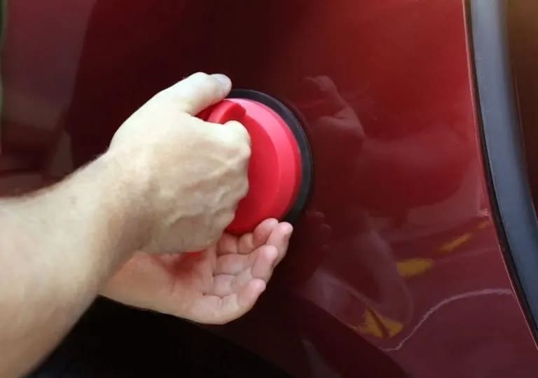 Paintless dent repair using suction cup