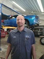 Staff member John Land from ID_ddb676