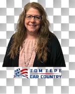 Staff member Lori Collins from ID_beddff0ad3fb