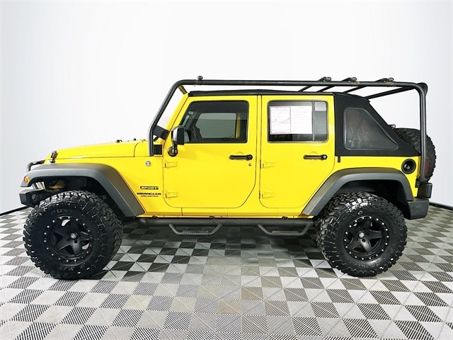 Used 2015 Jeep Wrangler Unlimited Sport with VIN 1C4BJWDG0FL609726 for sale in Milan, IN