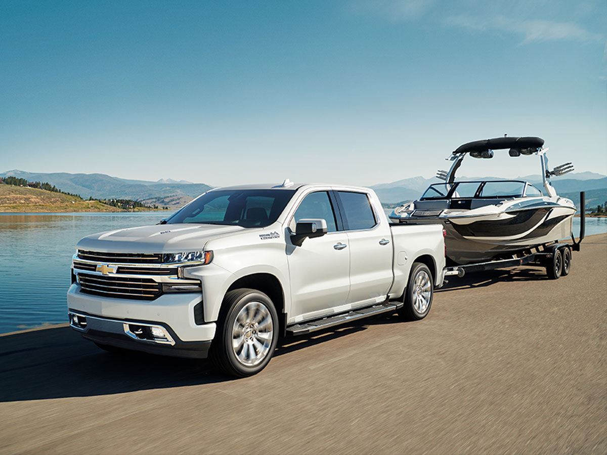  2025 Chevy Silverado 1500 trailering a boat
