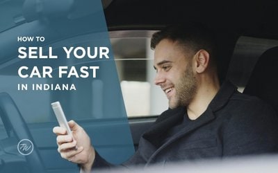 Person reviewing his All Good Offer from his cell phone to sell his car fast in Indiana with Tom Wood Automotive Group