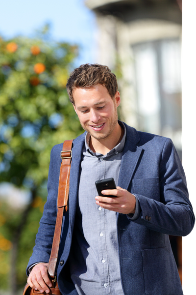 Car owner reviewing vehicle trade-in offer on phone - Tom Wood Automotive Group serving Indianapolis Carmel Noblesville and Central Indiana