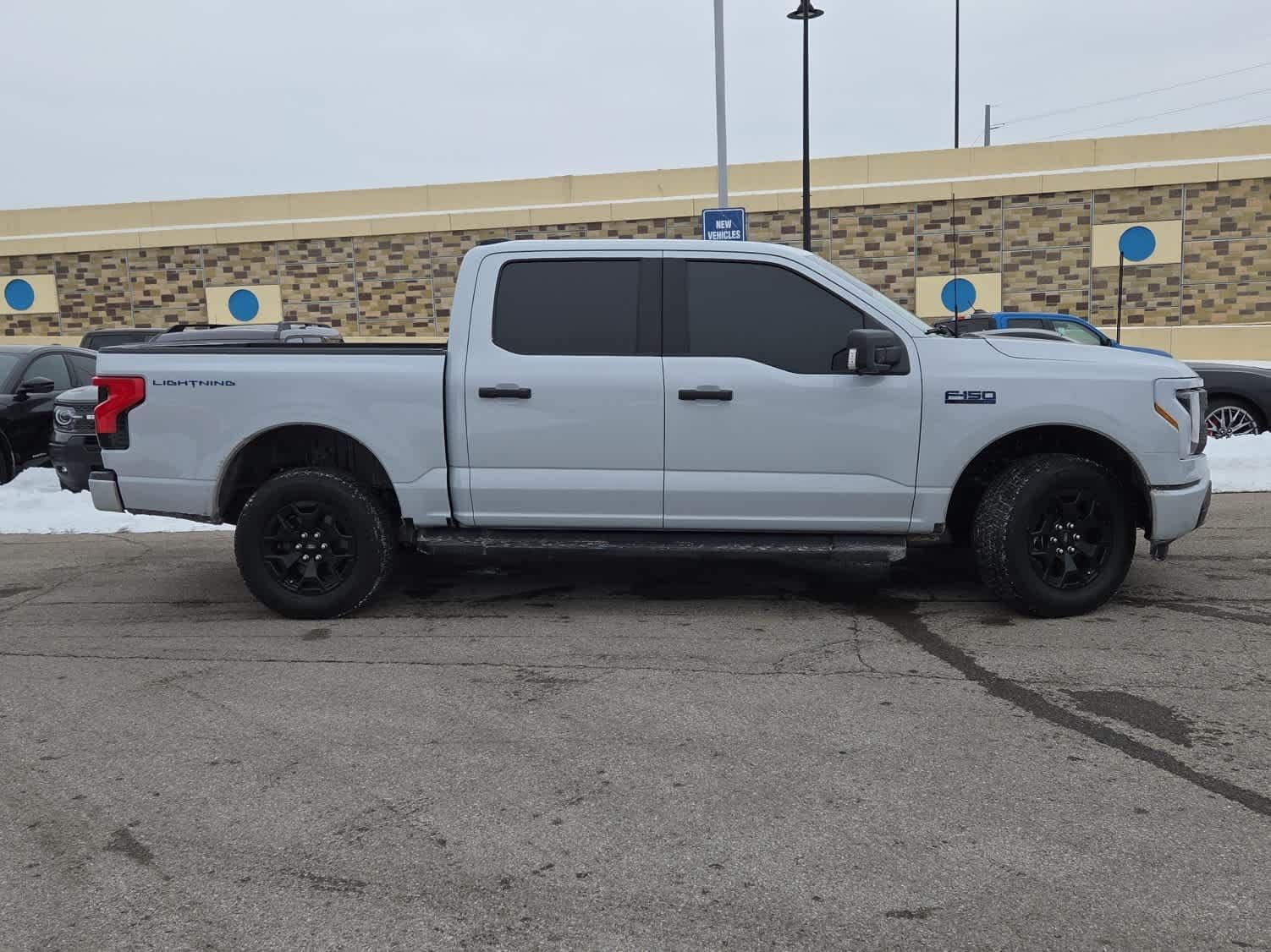 Certified 2025 Ford F-150 Lightning XLT with VIN 1FTVW3LK7SWG07127 for sale in Indianapolis, IN