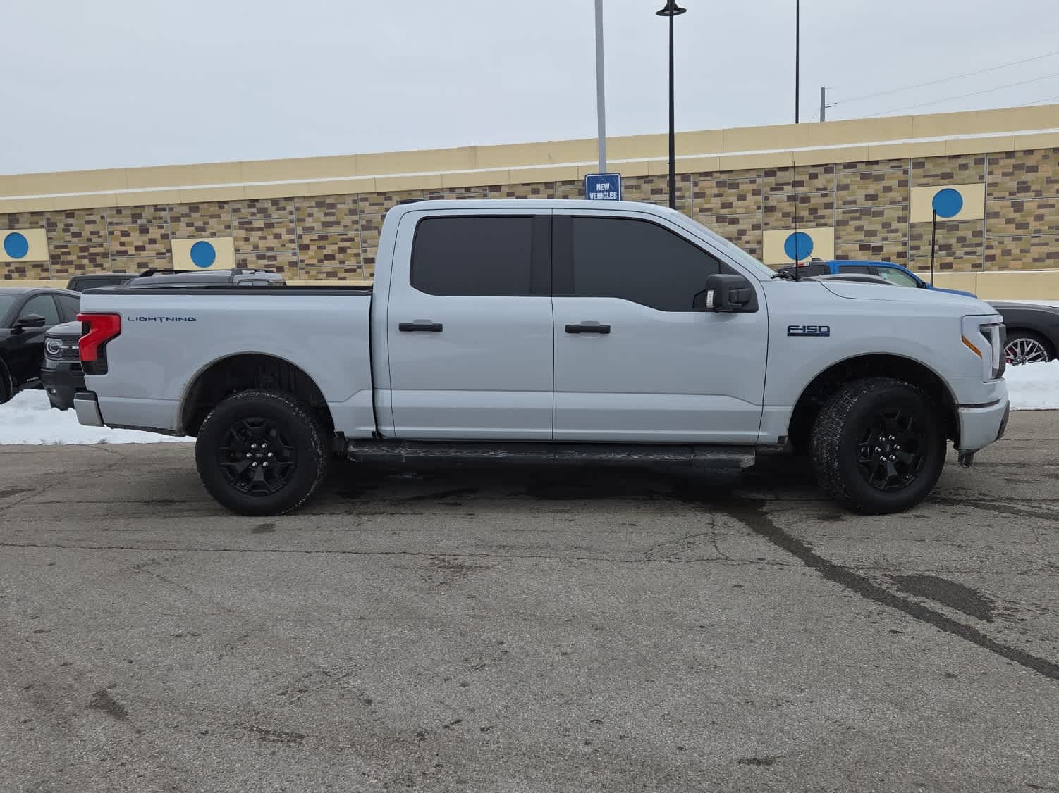 Certified 2025 Ford F-150 Lightning XLT with VIN 1FTVW3LK7SWG07127 for sale in Indianapolis, IN