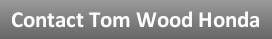 Contact Tom Wood Logo