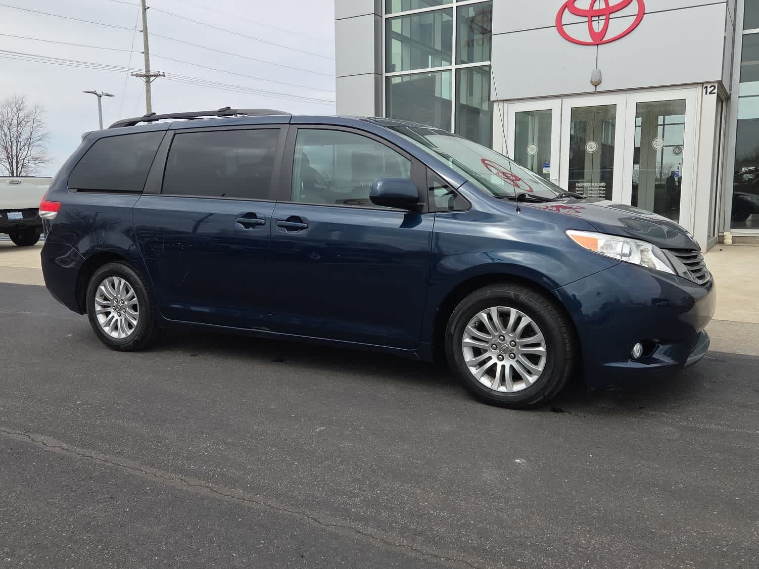 Used 2011 Toyota Sienna XLE with VIN 5TDYK3DC1BS133613 for sale in Whitestown, IN