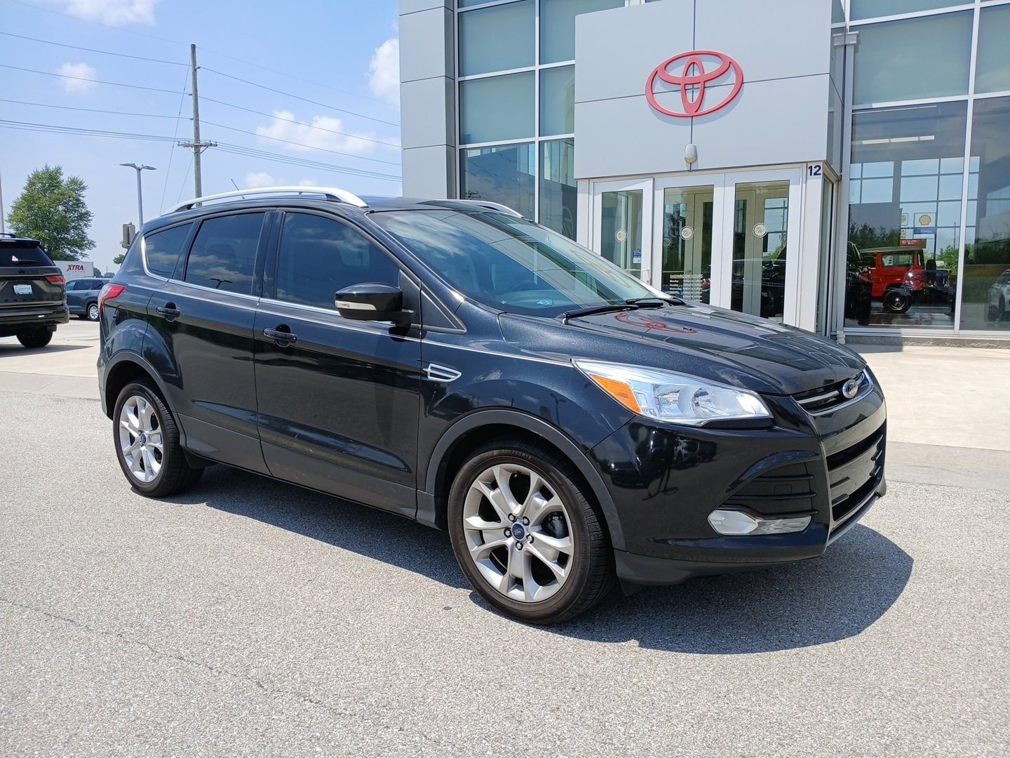 Used 2014 Ford Escape Titanium with VIN 1FMCU0JX7EUC19062 for sale in Whitestown, IN