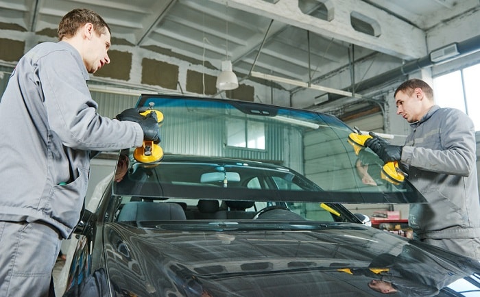 Men_Attaching_Windshield.jpg
