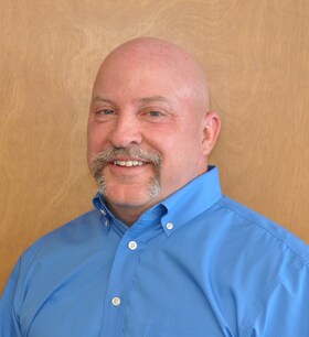 Staff member Tim Walters from cdfc34af49bf