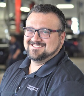 Staff member John Elliott from 4529f8e7e402
