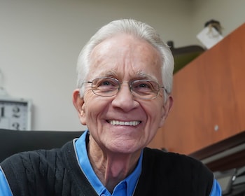 Staff member Dennis King from ID_589236