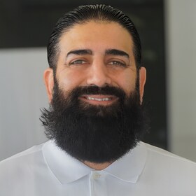 Staff member Gharzai Achekzai from ID_1dc951ab1e8e