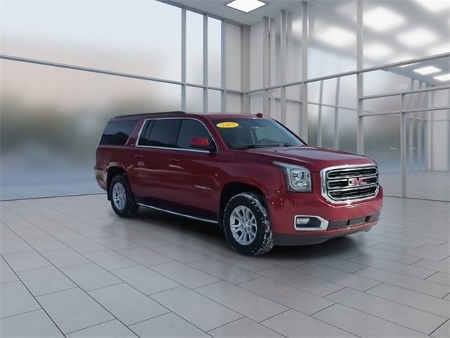 Used 2015 GMC Yukon XL SLE with VIN 1GKS2GKC1FR508487 for sale in Highland Charter Township, MI