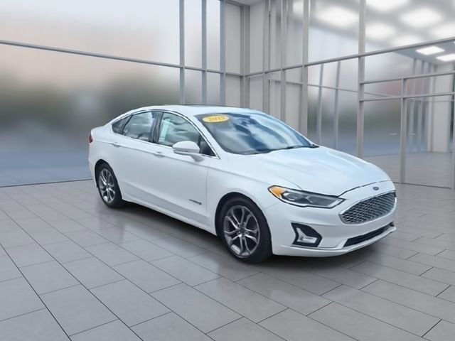 Used 2019 Ford Fusion Hybrid Titanium with VIN 3FA6P0RU7KR255751 for sale in Highland Charter Township, MI