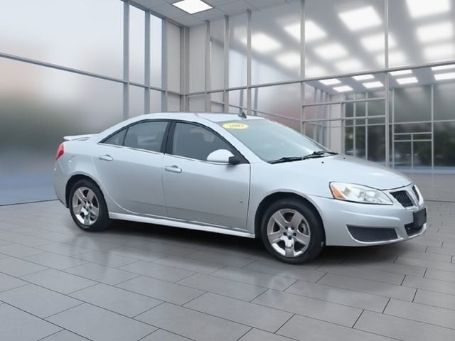 Used 2009 Pontiac G6 G6 with VIN 1G2ZJ57BX94236531 for sale in Highland Charter Township, MI