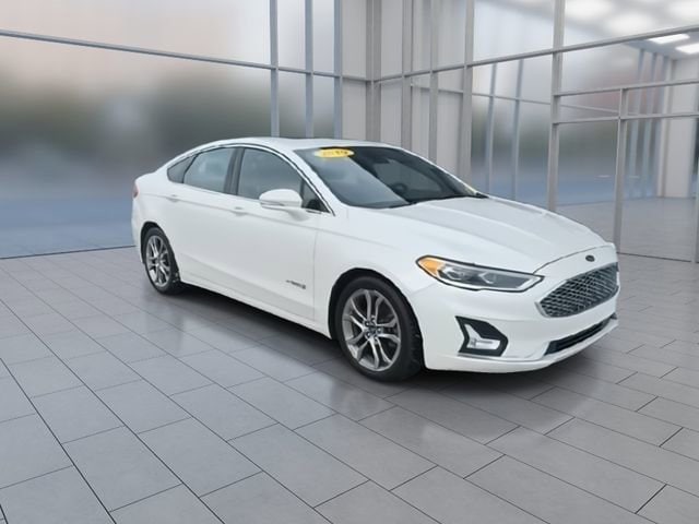 Used 2019 Ford Fusion Hybrid Titanium with VIN 3FA6P0RU7KR255751 for sale in Highland Charter Township, MI