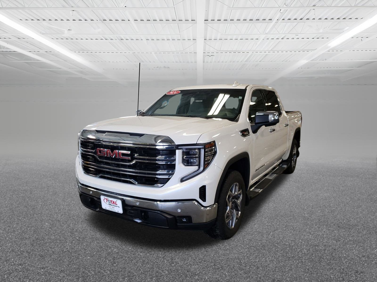 Used 2024 GMC Sierra 1500 SLT with VIN 3GTUUDEL2RG369628 for sale in Le Mars, IA
