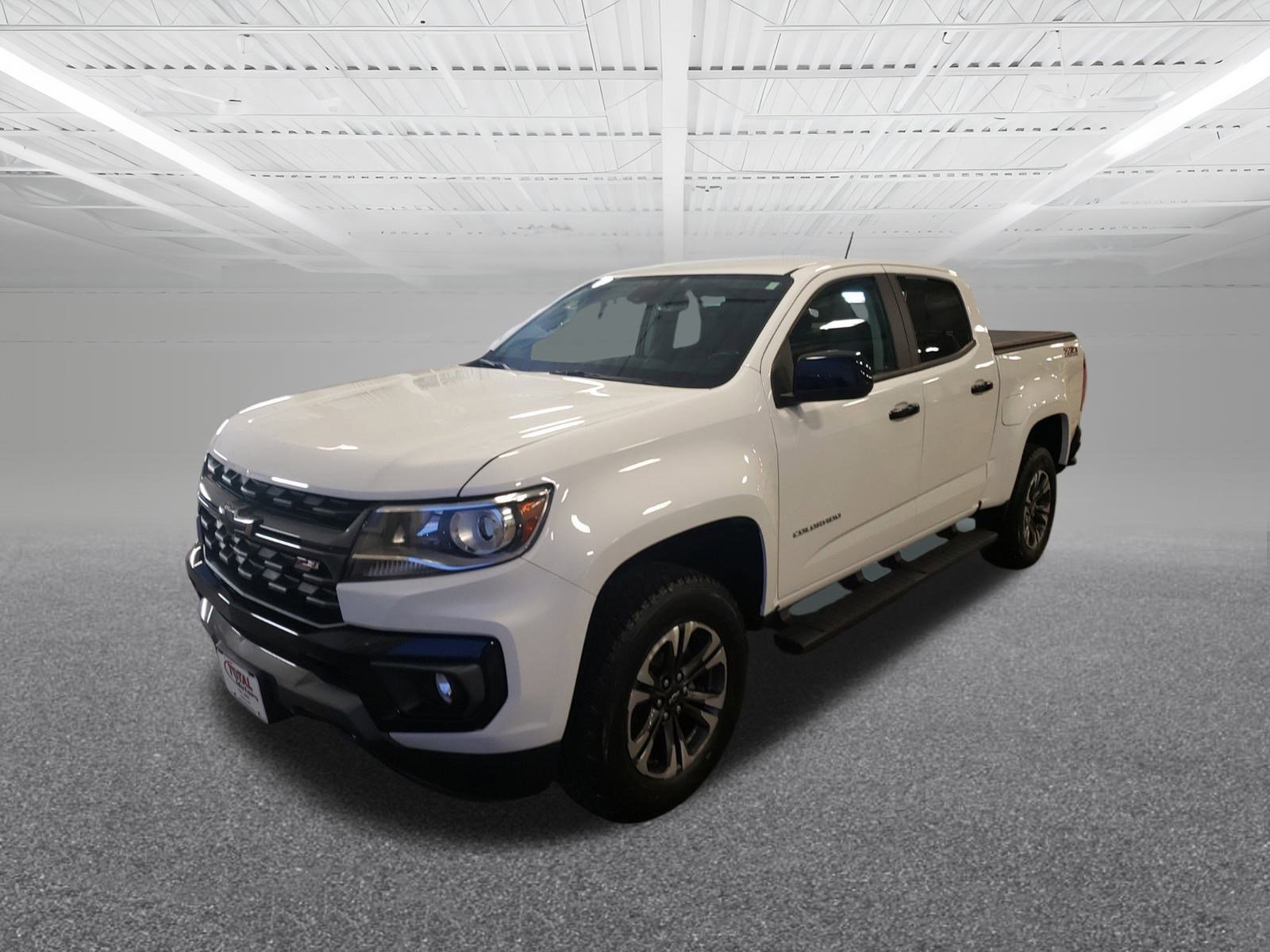 Used 2021 Chevrolet Colorado Z71 with VIN 1GCGTDEN8M1131579 for sale in Le Mars, IA