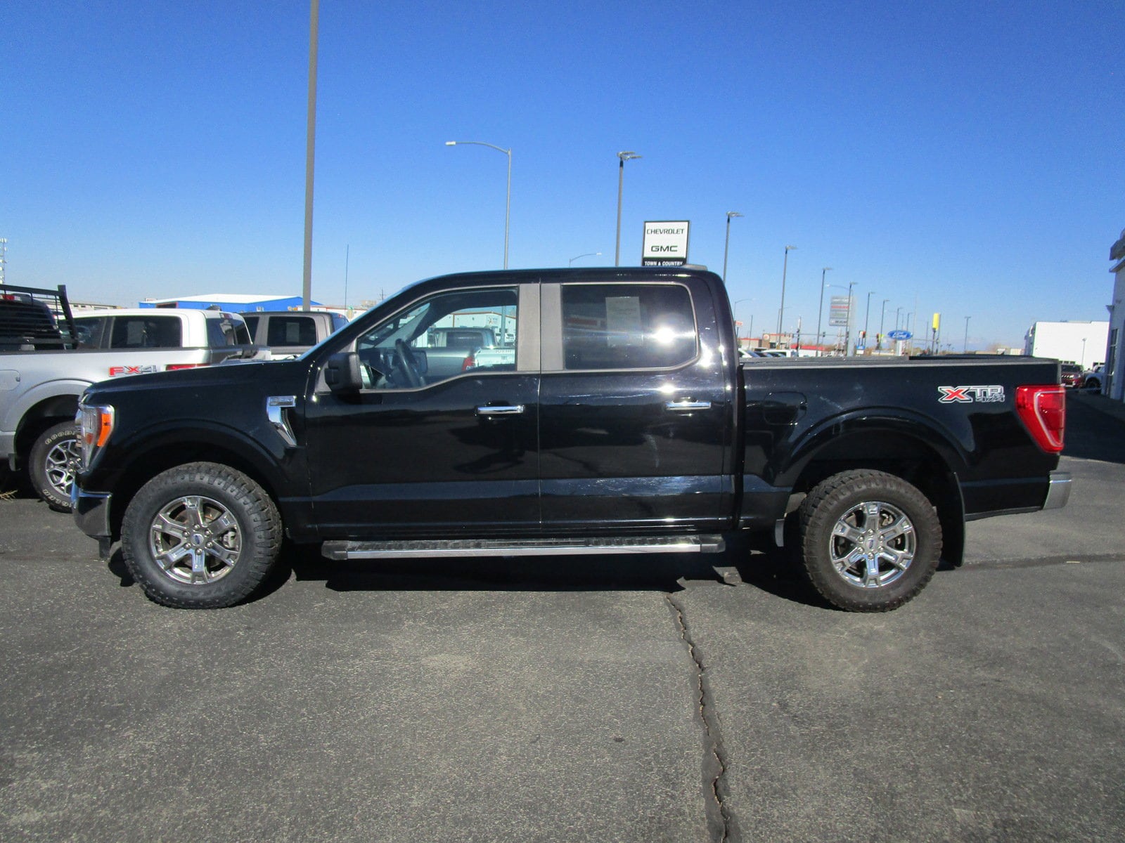 Used 2021 Ford F-150 XLT with VIN 1FTFW1E87MFA00514 for sale in Alamosa, CO