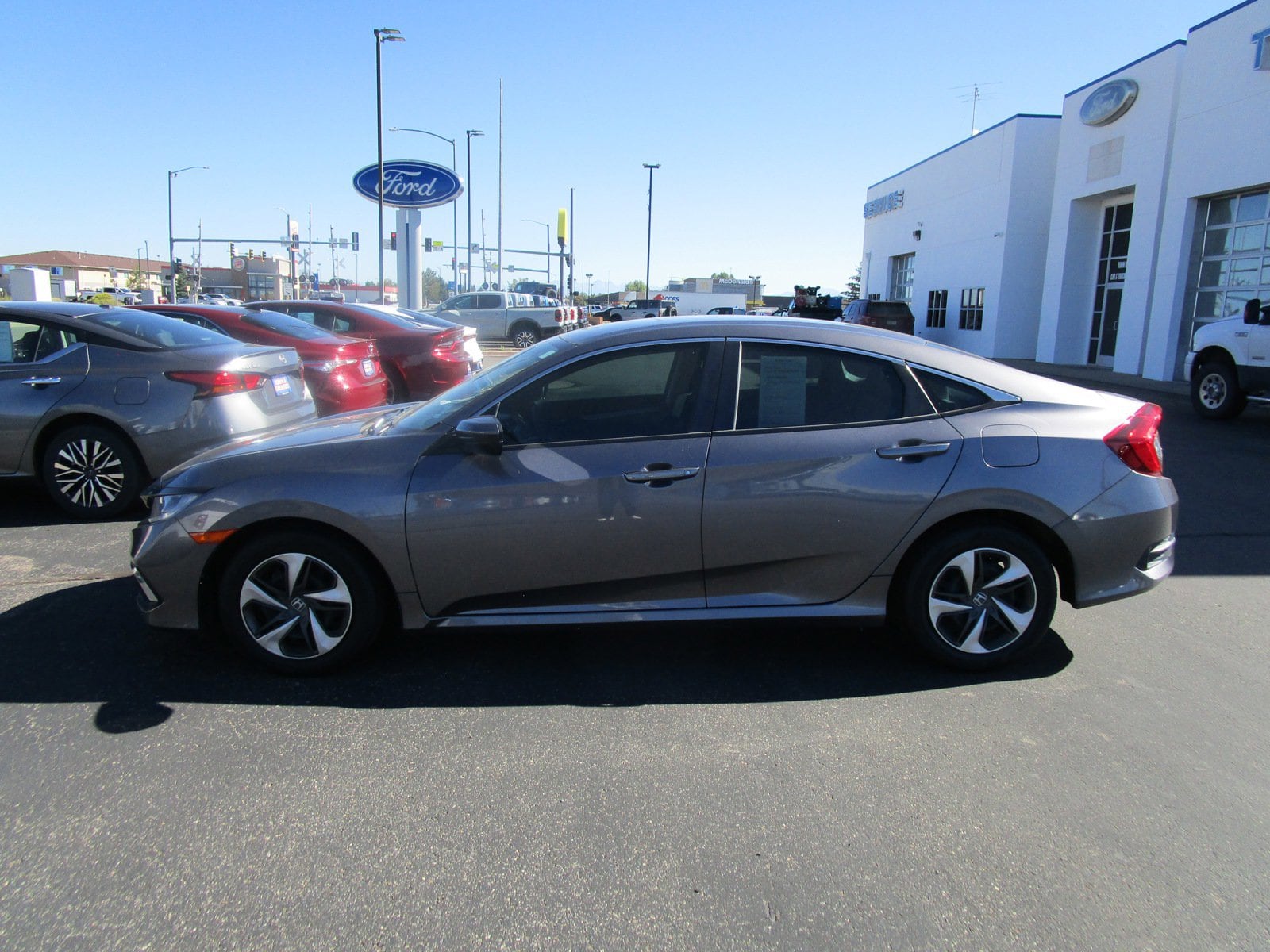 Used 2020 Honda Civic LX with VIN 19XFC2F63LE007013 for sale in Alamosa, CO