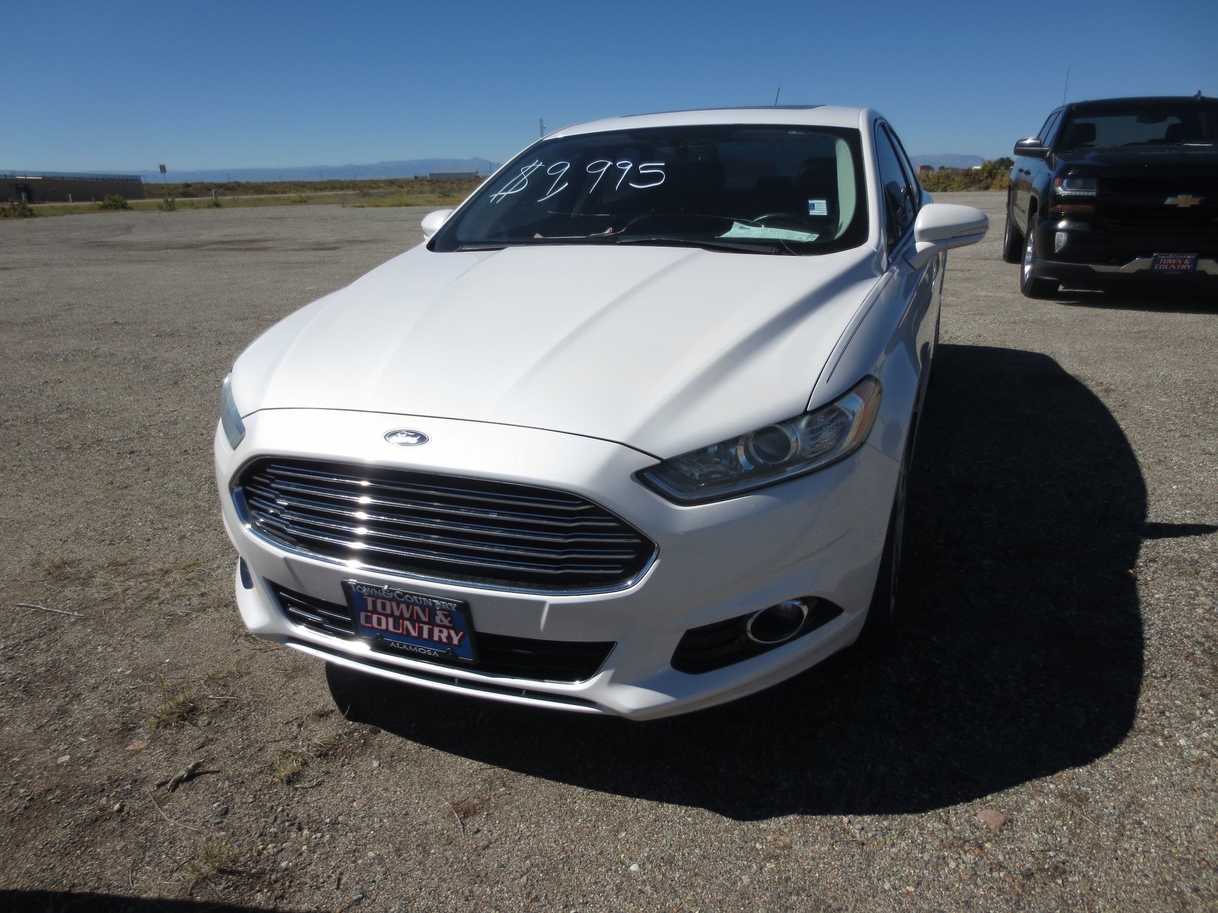 Used 2016 Ford Fusion Titanium with VIN 3FA6P0D91GR327022 for sale in Alamosa, CO