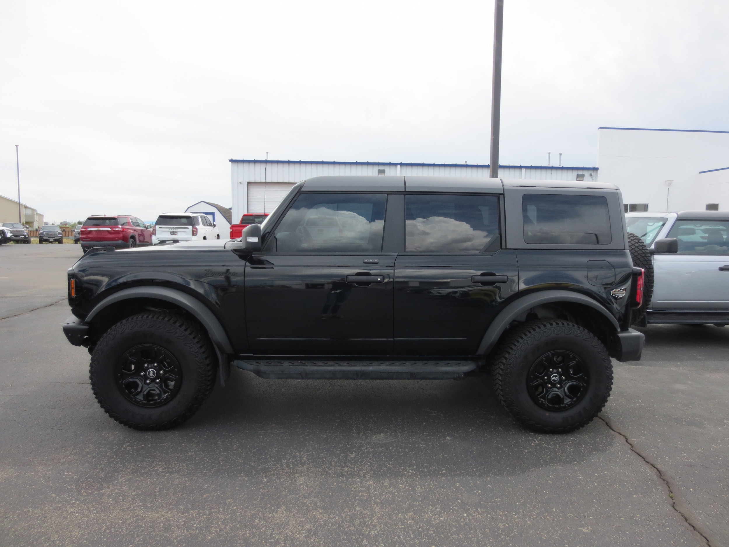 Used 2024 Ford Bronco 4-Door Wildtrak with VIN 1FMEE2BP0RLA25792 for sale in Alamosa, CO
