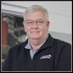 Staff member Charlie Tyra from ID_921668