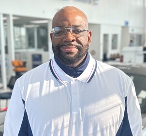 Staff member Lawrence Mcguire from ID_27dc57