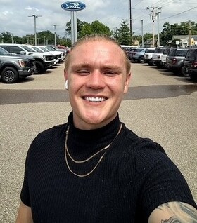 Staff member Gage Price from ID_27dc57