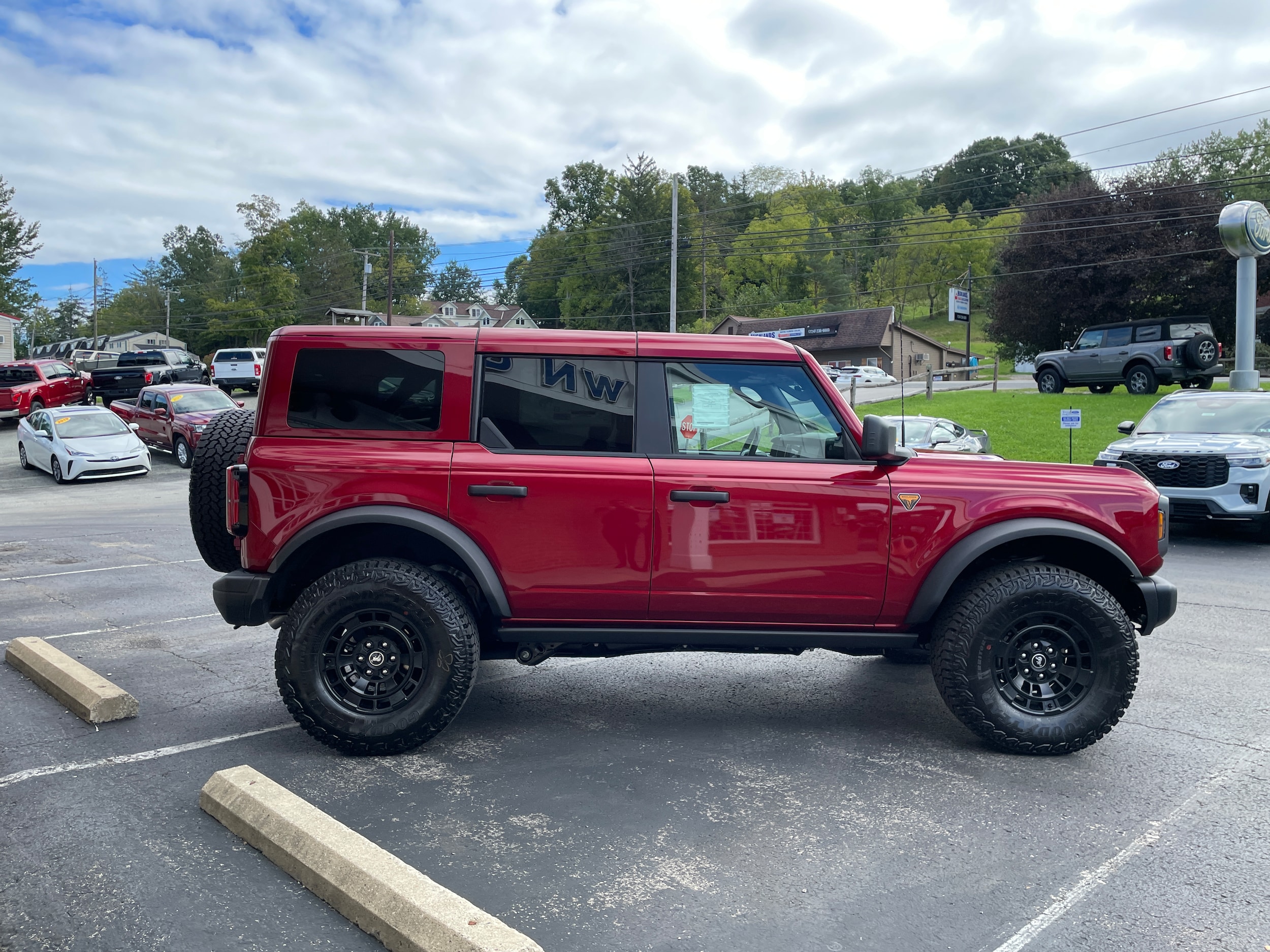 2026 Ford Bronco Badlands&reg; Ruby Red Metallic Tinted Clearcoat at Town & Country Ford