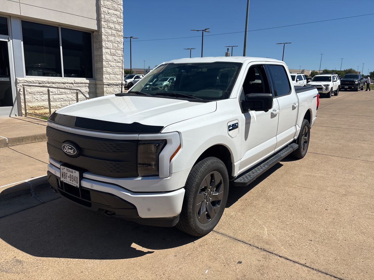 Oxford White 2024 Ford F-150 Lightning Flash SuperCrew AWD Pickup Truck All-Wheel Drive Automatic