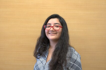Staff member Ana Rios from ID_65d416693106