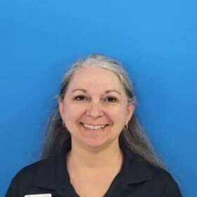 Staff member Sandra M. from ID_261988