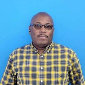 Staff member Orthamis "Shan" McShan from ID_2e30fe