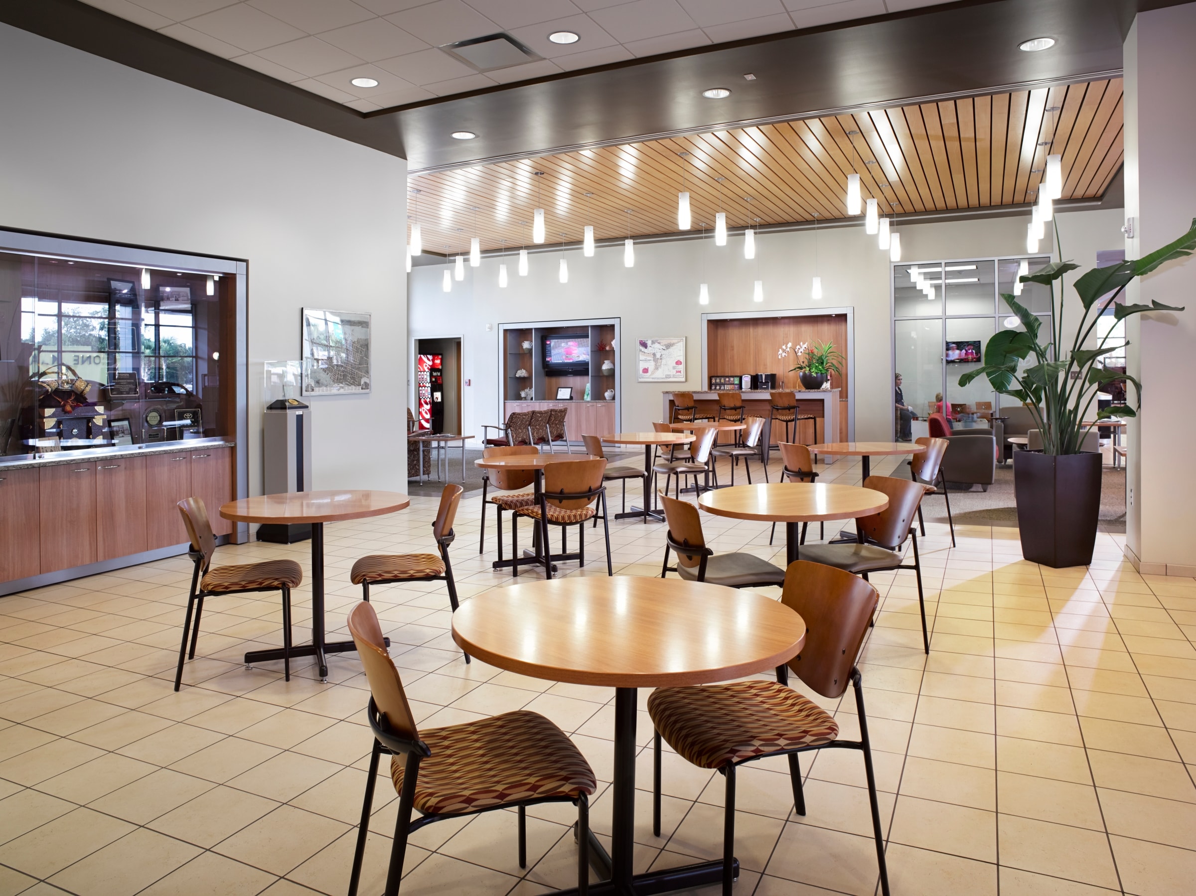  Person cheerfully signing documents.