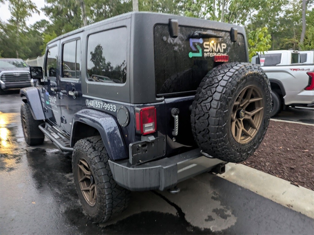 2013 Jeep Wrangler Unlimited Freedom photo 3