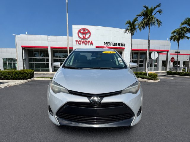 Used 2019 Toyota Corolla LE with VIN 5YFBURHE7KP931136 for sale in Deerfield Beach, FL