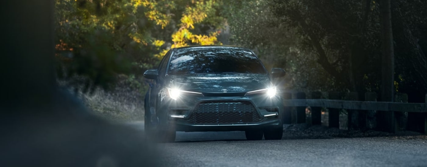 A grey 2025 Toyota Corolla from the front.