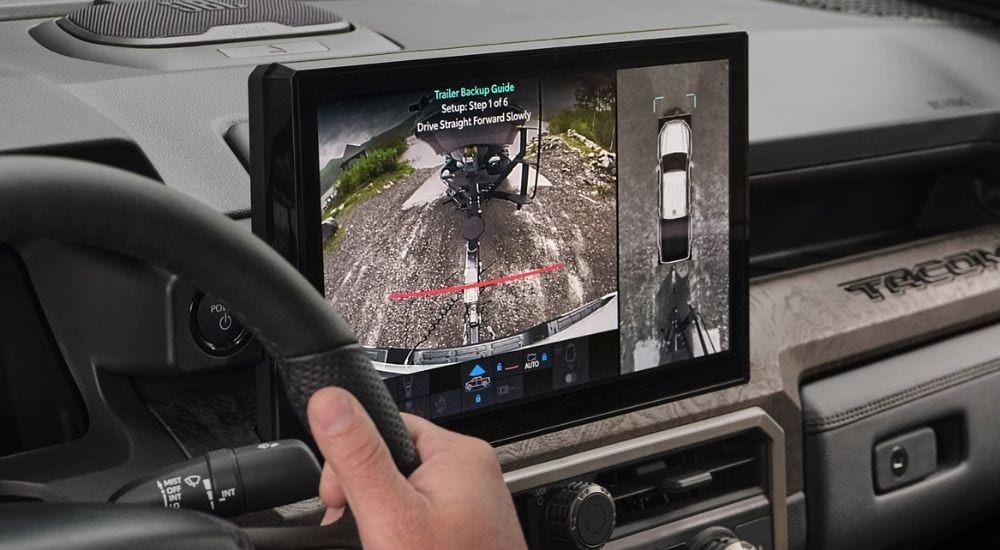 Close-up of the trailer backup guide screen in a 2024 Toyota Tacoma for sale.
