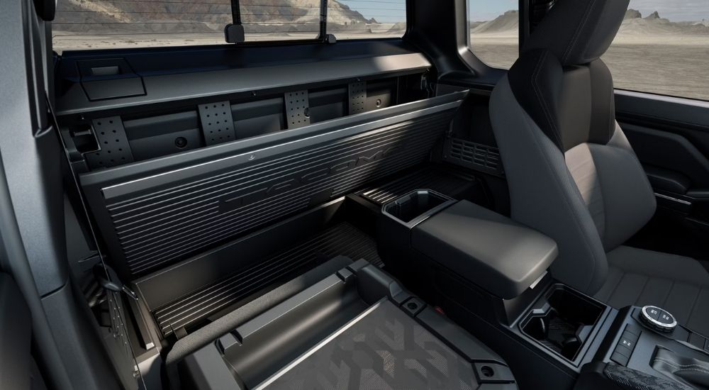 The XtraCab lockable rear panel in a 2024 Toyota Tacoma for sale.