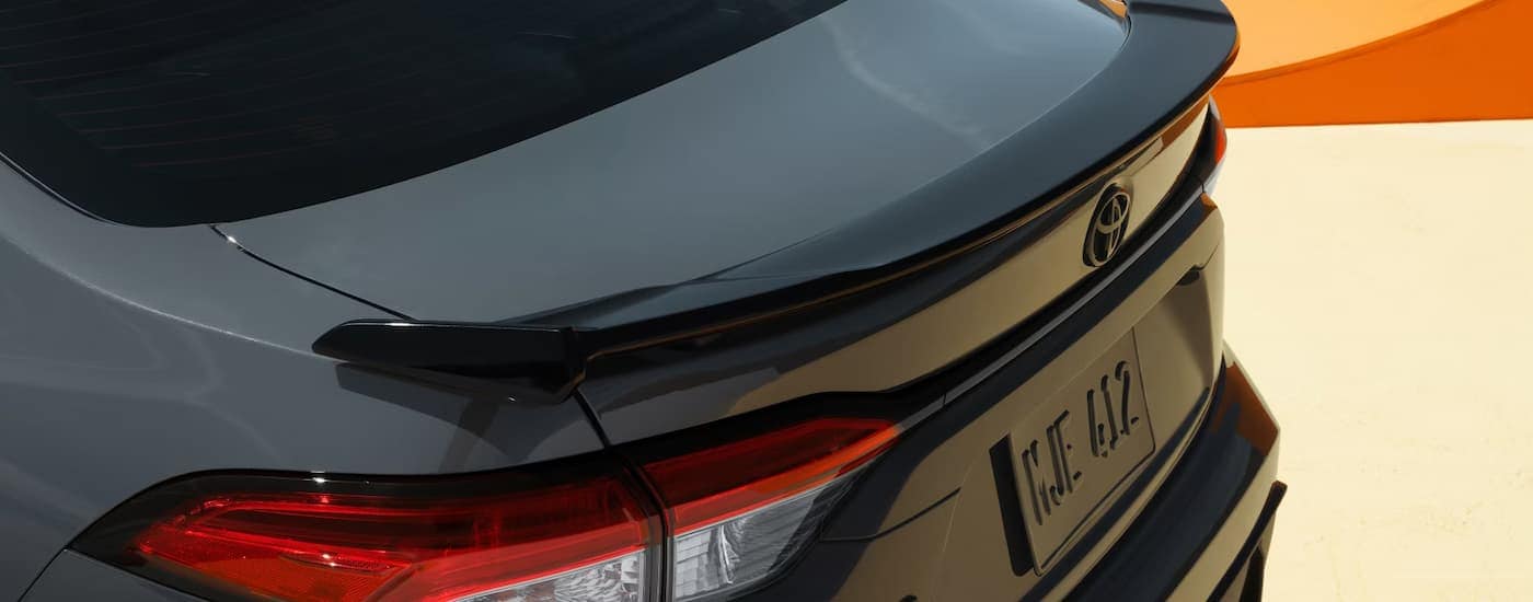 The spoiler on a black 2025 Toyota Corolla FX.