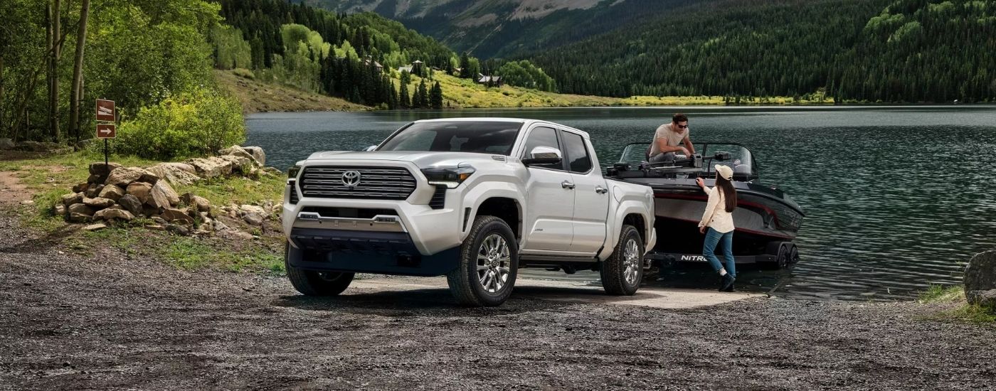 A white 2025 toyota Tacoma for sale near Nashville from the front.