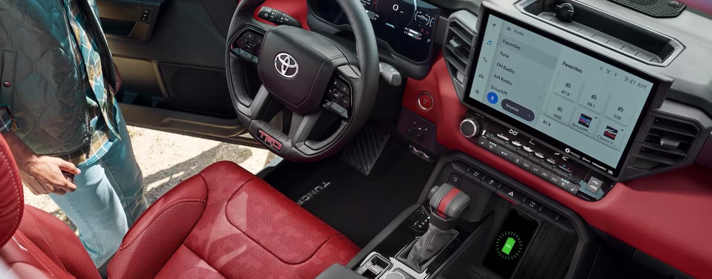 Red and black interior of a 2026 Toyota Tundra for sale near Cadiz