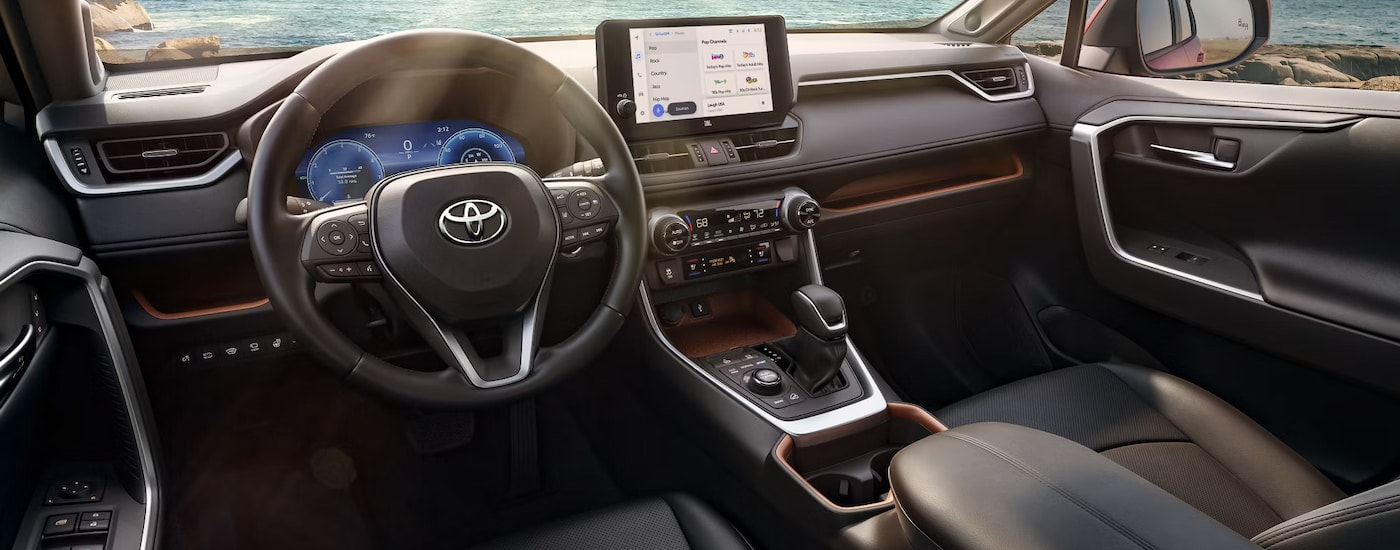 The interior of a 2024 Toyota RAV4 for sale.